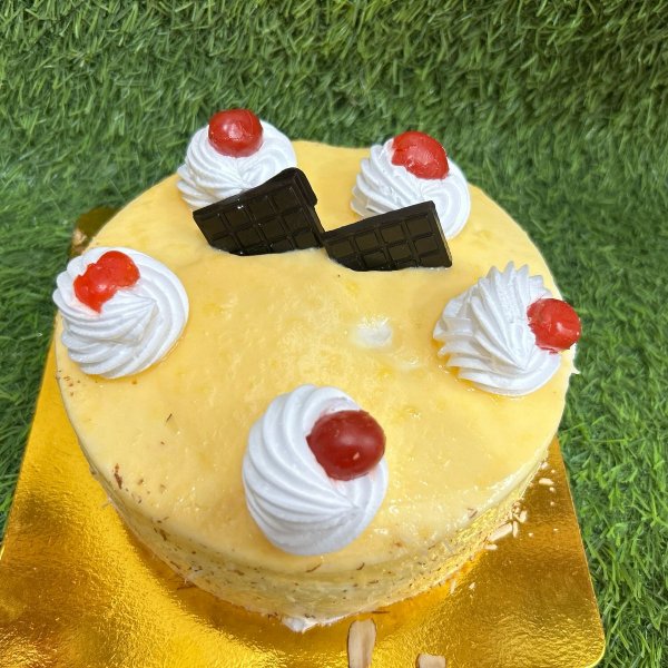 Santra barfi cake